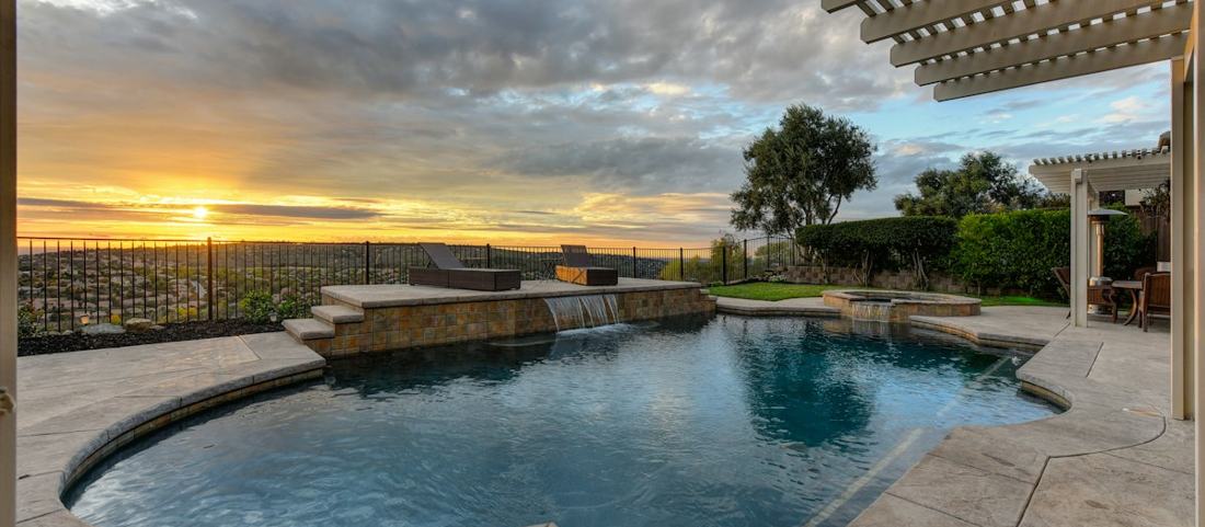 A renovated backyard pool and patio
